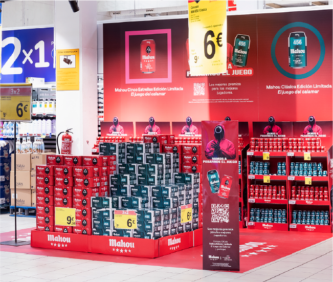 Activación promocional 2x1 de bebidas en supermercado